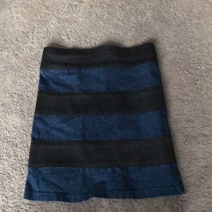 Denim and black striped skirt.
